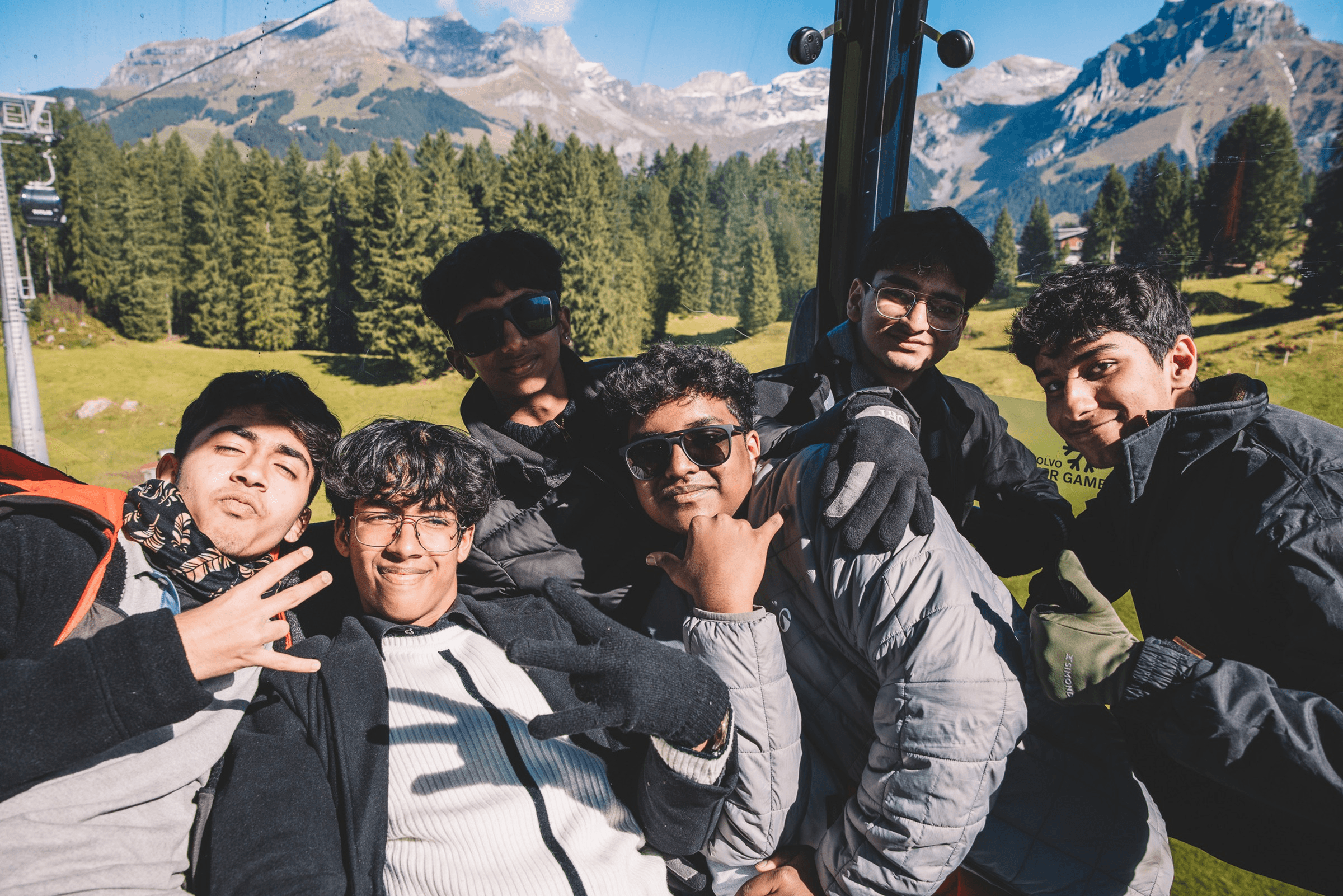 Students taking a group selfie on a forest learning immersion
