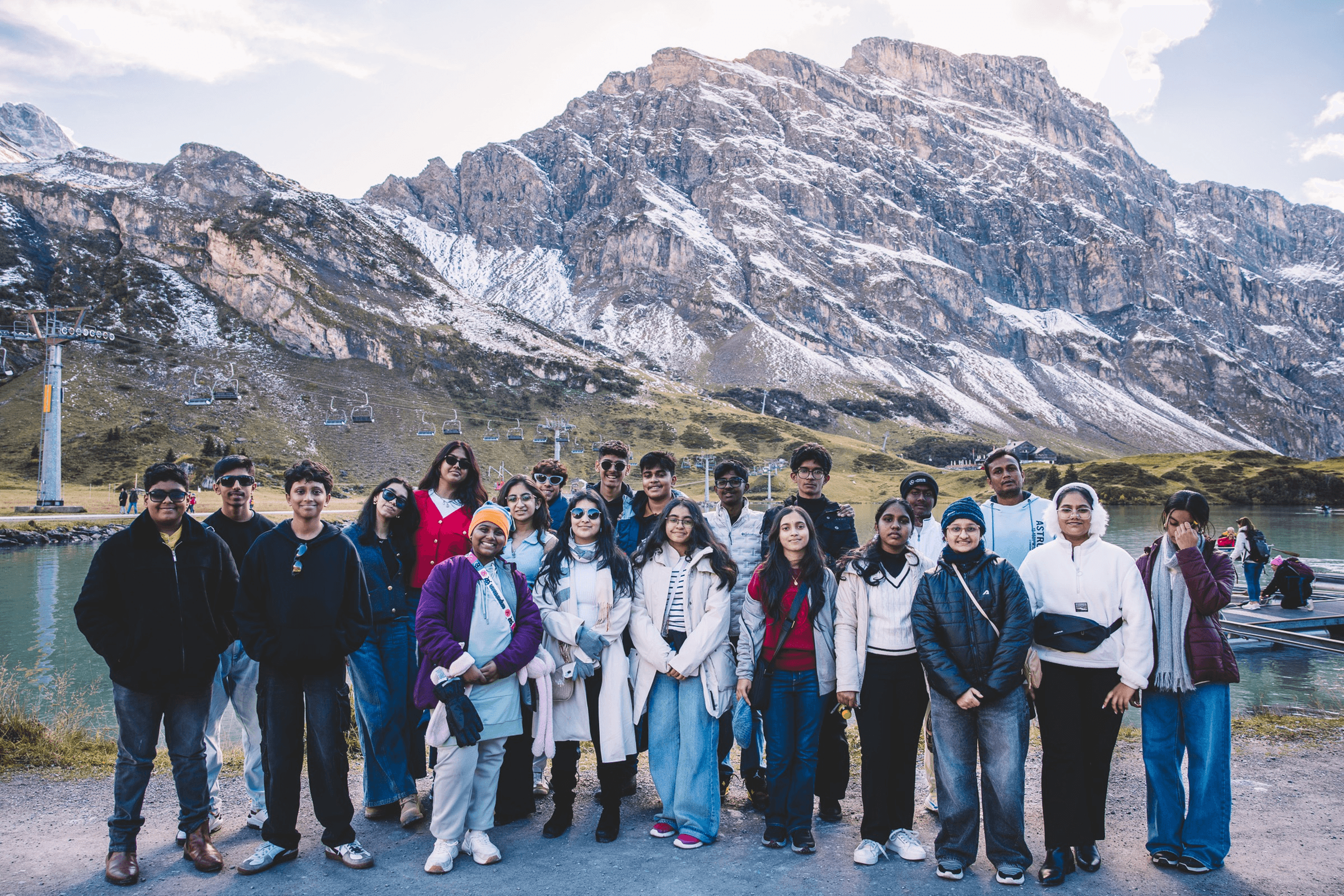 Student group in front of a snowy mountain during an international trip